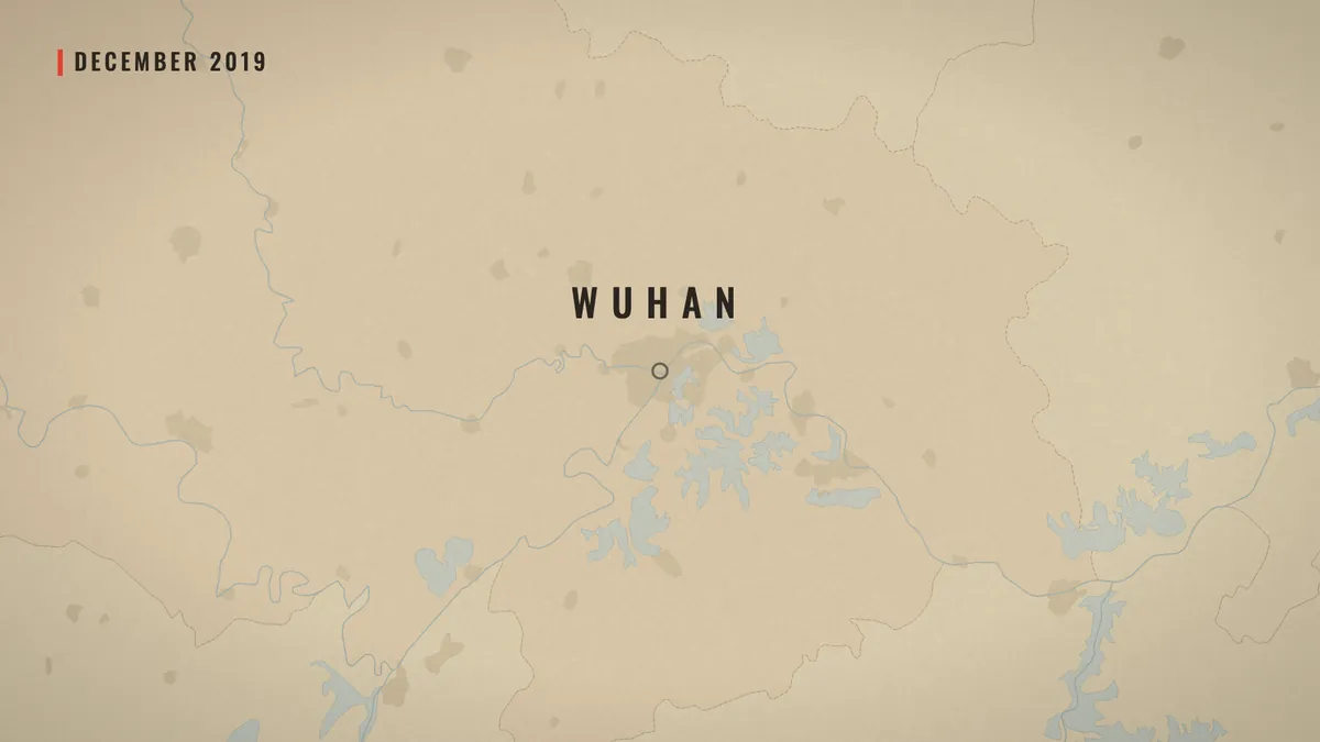 The paper map zoomed in on Wuhan, with the chip December 2019.